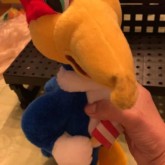 Charming Nostalgia: Woody Woodpecker Plush Collectible Cartoon Character.